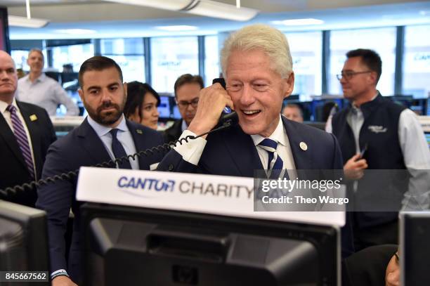 Former President Bill Clinton participates in Annual Charity Day hosted by Cantor Fitzgerald, BGC and GFI at Cantor Fitzgerald on September 11, 2017...