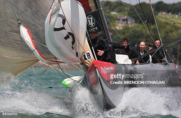 Alinghi prepares to raise there Spinaker during their race with Luna Rossa from Italy during round two of the series of the Louis Vuitton Pacific Cup...