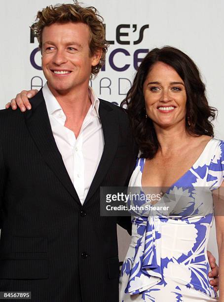 Actors Simon Baker and Robin Tunney pose in the press room at the 35th Annual People's Choice Awards held at the Shrine Auditorium on January 7, 2009...