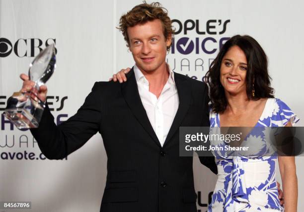 Actors Simon Baker and Robin Tunney pose in the press room at the 35th Annual People's Choice Awards held at the Shrine Auditorium on January 7, 2009...