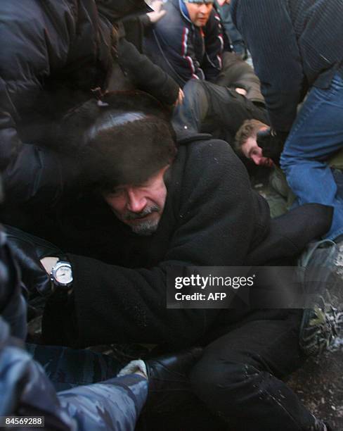 The head of the National Bolshevik Party, Eduard Limonov , is arrested by police officers on January 31, 2009 during an opposition rally in the...