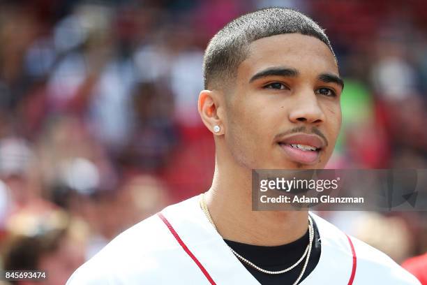 Boston Celtics first round draft pick Jayson Tatum looks on before throwing out the ceremonial first pitch before a game between the Boston Red Sox...