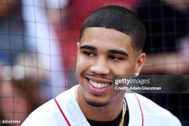 Boston Celtics first round draft pick Jayson Tatum looks on before throwing out the ceremonial first pitch before a game between the Boston Red Sox...