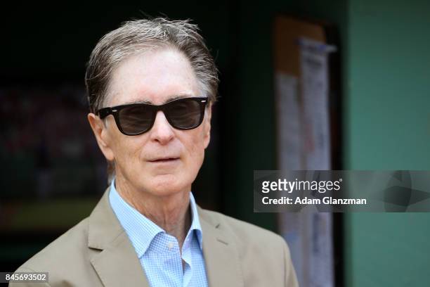 Boston Red Sox owner John Henry looks on before a game between the Boston Red Sox and the Tampa Bay Rays at Fenway Park on September 10, 2017 in...