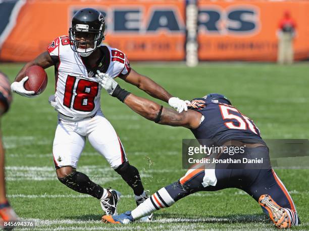Taylor Gabriel of the Atlanta Falcons shakes off Jerrell Freeman of the Chicago Bears during the season opening game at Soldier Field on September...