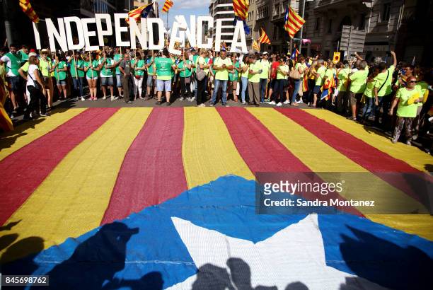 People march during a demonstration celebrating the Catalan National Day on September 11, 2017 in Barcelona, Spain. The Spanish Northeastern...