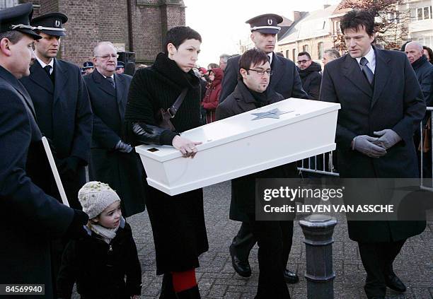 The mother and father of baby Leon Garcia-Mannaert, carry on January 31, 2009 the coffin of their six-months-old at his funeral, out of the...