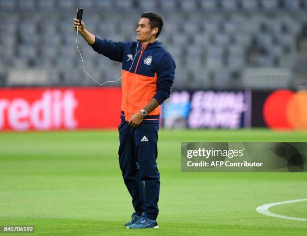 Anderlecht's midfielder Andy Najar from Honduras takes a picture during a first visit prior the team training session ahead the first Champions...