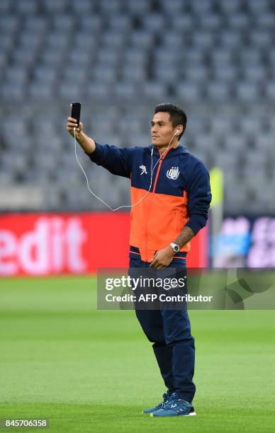 Anderlecht's midfielder Andy Najar from Honduras takes a picture during a first visit prior the team training session ahead the first Champions...