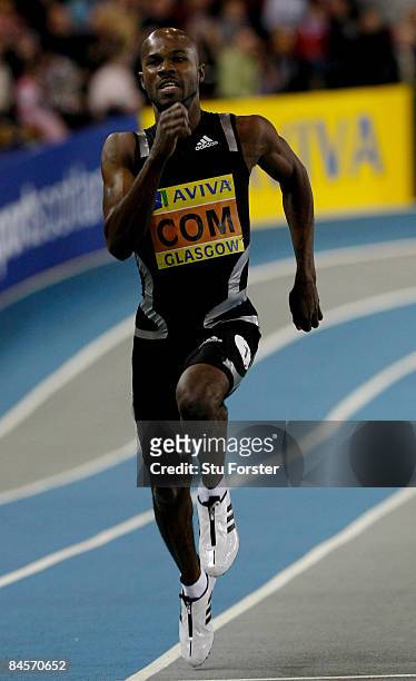 Kim Collins of The Commonealth team in action on his way to winning the Mens 200 metres during the Aviva International Match at Kelvin Hall on...