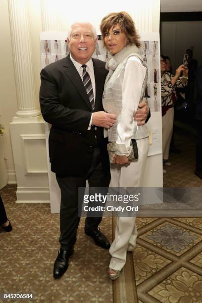 Designer Dennis Basso and actress Lisa Rinna backstage at Dennis Basso fashion show during New York Fashion Week: The Shows at The Plaza Hotel on...