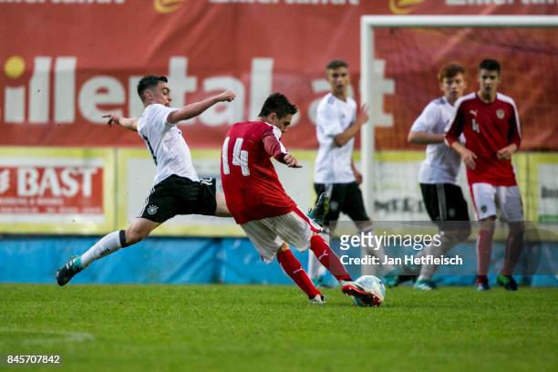 Edin Mujkanovic of Austria kicks the ball during the friendly match between U16 Austria and U16 Germany on September 11, 2017 in Zell am Ziller,...