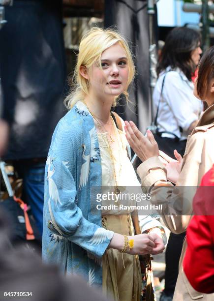 Actress Eile Fanning and Selena Gomez on the set of Woody Allen movie on September 11, 2017 in New York City.