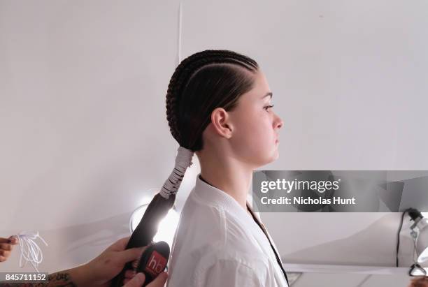 Model prepares, hair detail, backstage for Hakan Akkaya fashion show during New York Fashion Week: The Shows at Gallery 2, Skylight Clarkson Sq on...