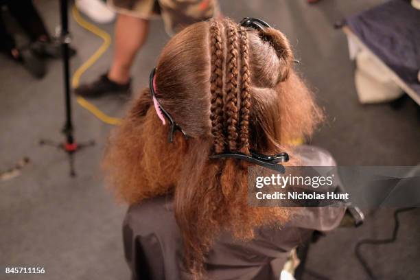 Model prepares, hair detail, backstage for Hakan Akkaya fashion show during New York Fashion Week: The Shows at Gallery 2, Skylight Clarkson Sq on...