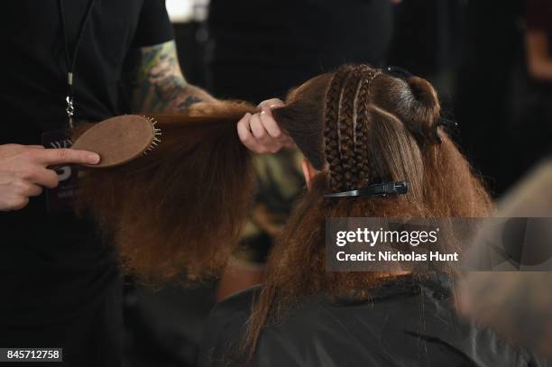 Model prepares backstage for Hakan Akkaya fashion show during New York Fashion Week: The Shows at Gallery 2, Skylight Clarkson Sq on September 11,...