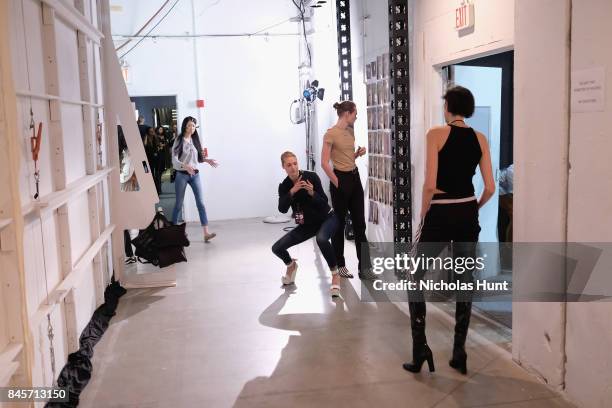 Models prepare backstage for Hakan Akkaya fashion show during New York Fashion Week: The Shows at Gallery 2, Skylight Clarkson Sq on September 11,...