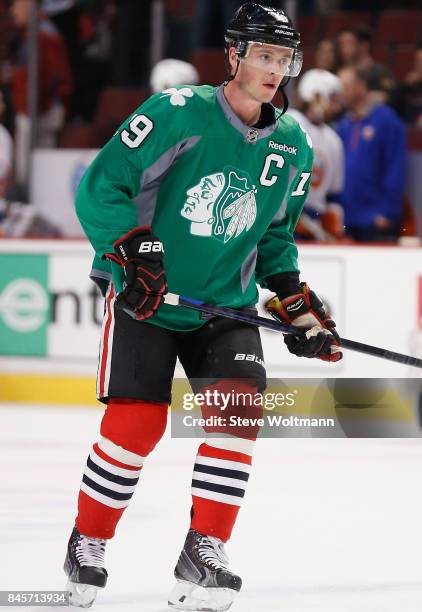 Jonathan Toews of the Chicago Blackhawks warms up before the game against the New York Islanders at the United Center on March 17, 2015 in Chicago,...