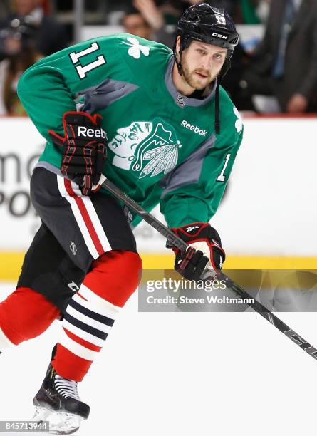 Andrew Desjardins of the Chicago Blackhawks warms up before the game against the New York Islanders at the United Center on March 17, 2015 in...