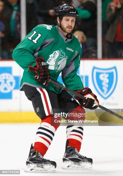 Andrew Desjardins of the Chicago Blackhawks warms up before the game against the New York Islanders at the United Center on March 17, 2015 in...