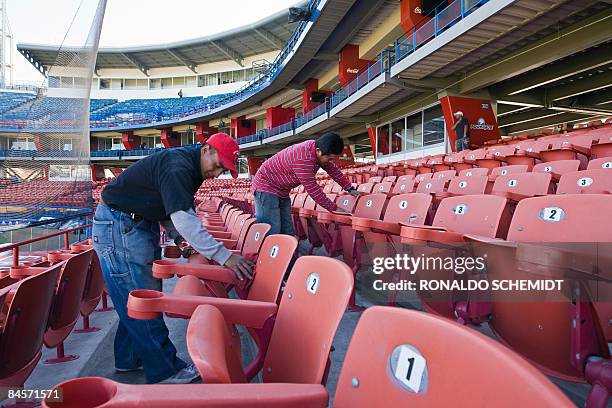 Workers gives the final touches to the Casas Geo stadium, in preparation for the Baseball Caribbean Series that will take place on February 2-7, in...