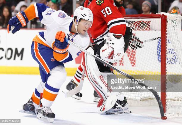 Kyle Okposo of the New York Islanders plays in the game against the Chicago Blackhawks at the United Center on March 17, 2015 in Chicago, Illinois.