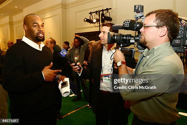 Philadelphia Eagles quarterback Donovan McNabb talks to the media after testing the ID Coach Wristband at the launch of the Isaac Daniel, ID Coach at...