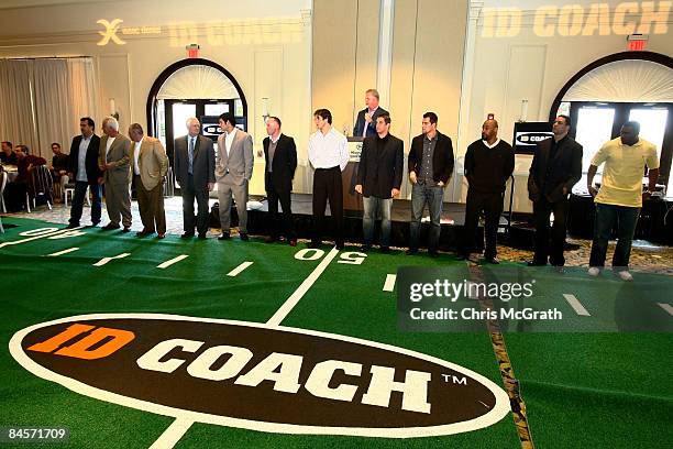 Players and coaches wait to test out the ID Coach at the launch of the Isaac Daniel, ID Coach at the Sheraton Riverwalk on January 31, 2009 in Tampa,...