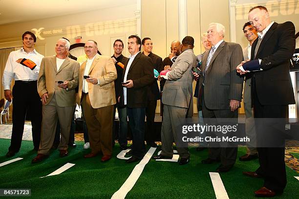 Players and coaches test out the ID Coach at the launch of the Isaac Daniel, ID Coach at the Sheraton Riverwalk on January 31, 2009 in Tampa,...