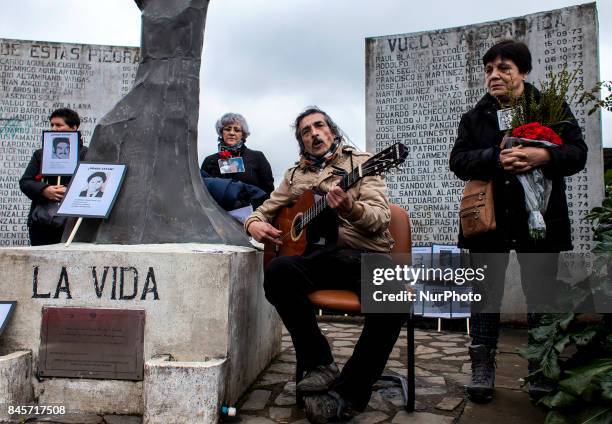 Osorno, Chile. 11 September 2017. Musician sings during the ceremony held at the memorial of the disappeared detainee. Relatives of the Disappeared,...