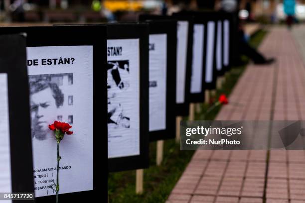 Osorno, Chile. 11 September 2017. Photographs with the faces of disappeared detainees of the military dictatorship. Relatives of the Disappeared,...