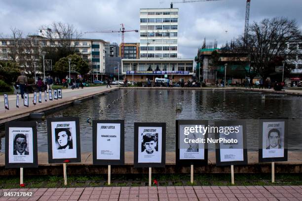 Osorno, Chile. 11 September 2017. Photographs with the faces of disappeared detainees of the military dictatorship. Relatives of the Disappeared,...