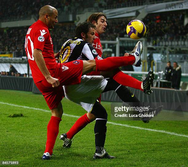 Alessandro Del Piero of Juventus fights for the ball with Paolo Bianco and Daniele Conti of Cagliari during the Serie A football match between FC...