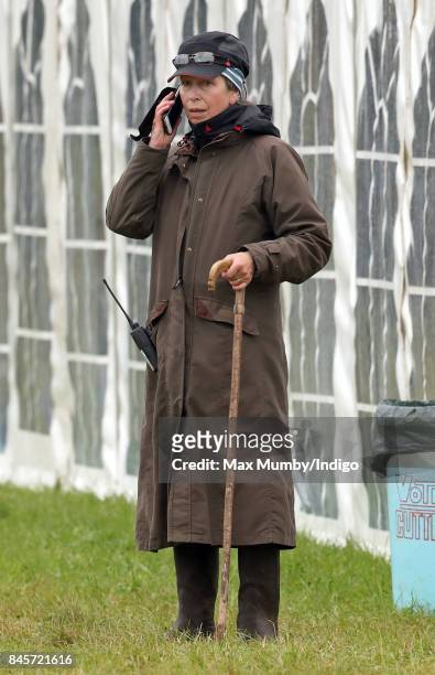 Princess Anne, Princess Royal uses her mobile phone as she attends day 3 of the Whatley Manor Horse Trials at Gatcombe Park on September 10, 2017 in...
