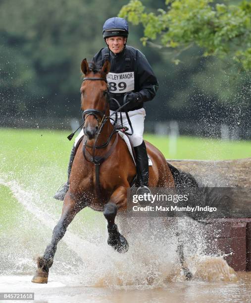 William Fox-Pitt competes on his horse 'Georgisaurous' in the cross country phase of the Whatley Manor Horse Trials at Gatcombe Park on September 10,...
