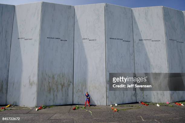 Superman action figure left under the name of passenger Lewis J. Nacke II at the Flight 93 National Memorial on the 16th Anniversary ceremony of the...