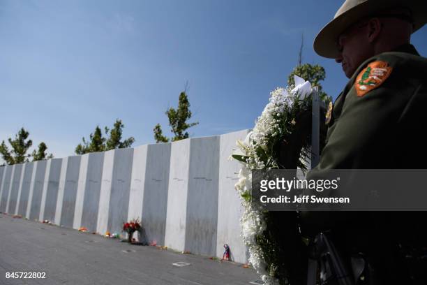 National Park Service Ranger presents a wreath at the Flight 93 National Memorial on the 16th Anniversary ceremony of the September 11th terrorist...
