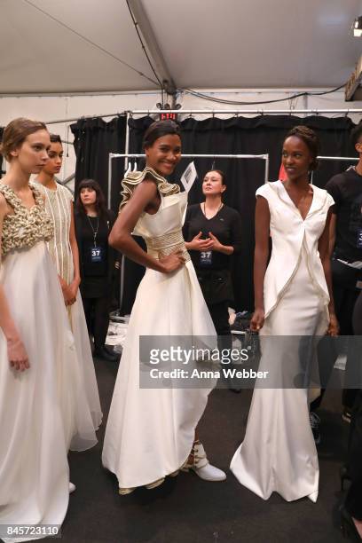 Models prepare backstage for John Paul Ataker fashion show during New York Fashion Week: The Shows at Gallery 1, Skylight Clarkson Sq on September...