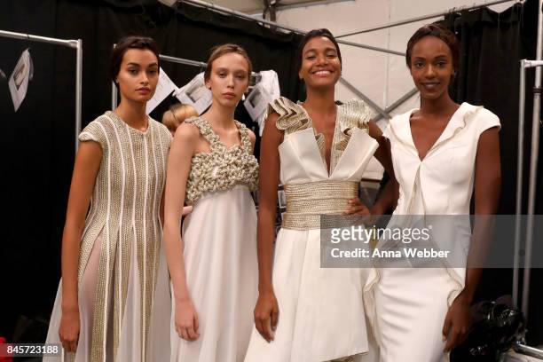 Modelsl prepare backstage for John Paul Ataker fashion show during New York Fashion Week: The Shows at Gallery 1, Skylight Clarkson Sq on September...