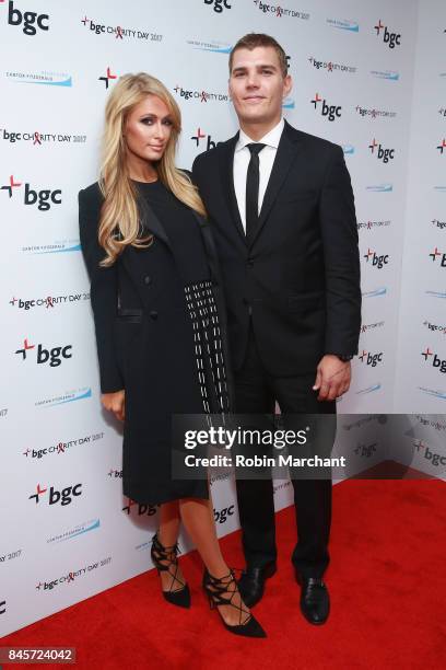Model Paris Hilton and actor Chris Zylka attend Annual Charity Day hosted by Cantor Fitzgerald, BGC and GFI at BGC Partners, INC on September 11,...