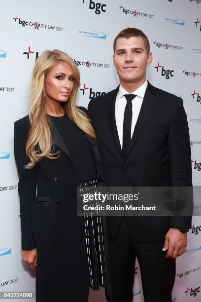 Model Paris Hilton and actor Chris Zylka attend Annual Charity Day hosted by Cantor Fitzgerald, BGC and GFI at BGC Partners, INC on September 11,...