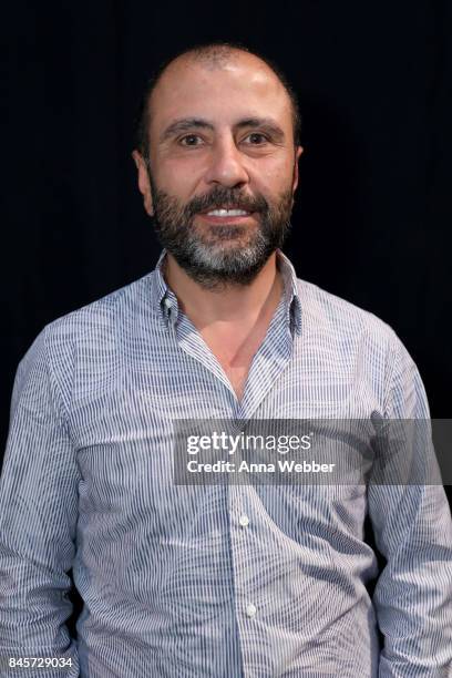 Designer Numan Ataker poses backstage for John Paul Ataker fashion show during New York Fashion Week: The Shows at Gallery 1, Skylight Clarkson Sq on...