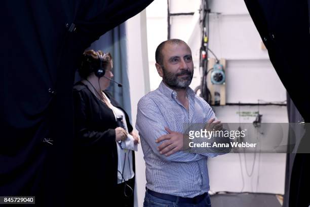 Designer Numan Ataker prepares backstage for John Paul Ataker fashion show during New York Fashion Week: The Shows at Gallery 1, Skylight Clarkson Sq...