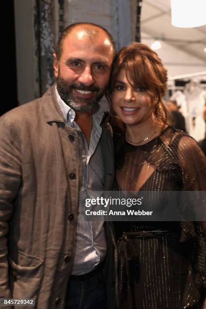 Designer Numan Ataker and Paula Abdul prepares backstage for John Paul Ataker fashion show during New York Fashion Week: The Shows at Gallery 1,...