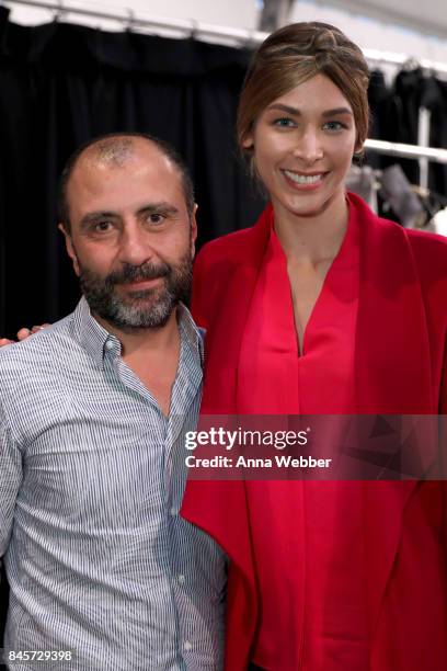 Designer Numan Ataker and a model pose backstage for John Paul Ataker fashion show during New York Fashion Week: The Shows at Gallery 1, Skylight...