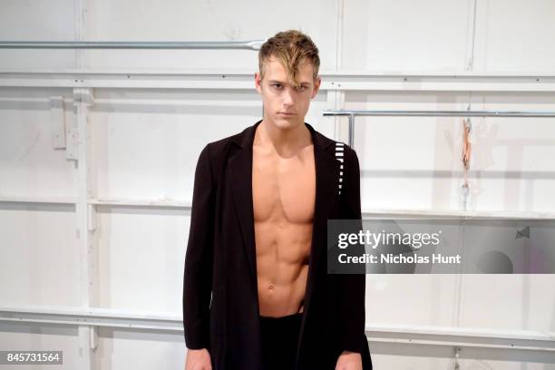 Model prepares backstage for Hakan Akkaya fashion show during New York Fashion Week: The Shows at Gallery 2, Skylight Clarkson Sq on September 11,...