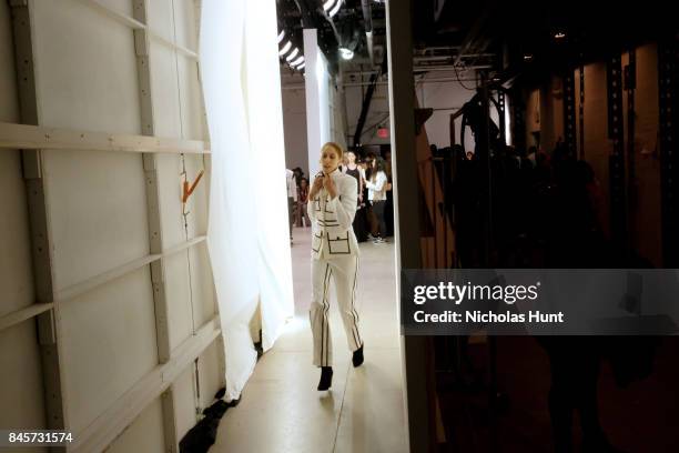 Model prepares backstage for Hakan Akkaya fashion show during New York Fashion Week: The Shows at Gallery 2, Skylight Clarkson Sq on September 11,...