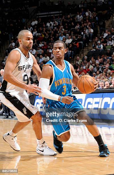 Chris Paul of the New Orleans Hornets drives against Tony Parker of the San Antonio Spurs on January 31, 2009 at the AT&T Center in San Antonio,...
