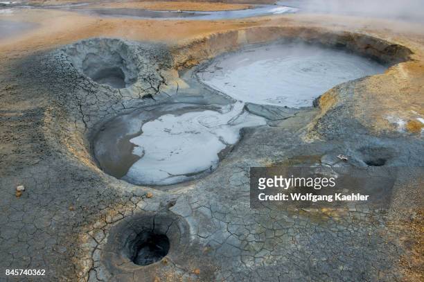 Boiling mud pots in the hot spring area named Hverir, east of Mt. Namafjall near Lake Myvatn in Northeast Iceland.