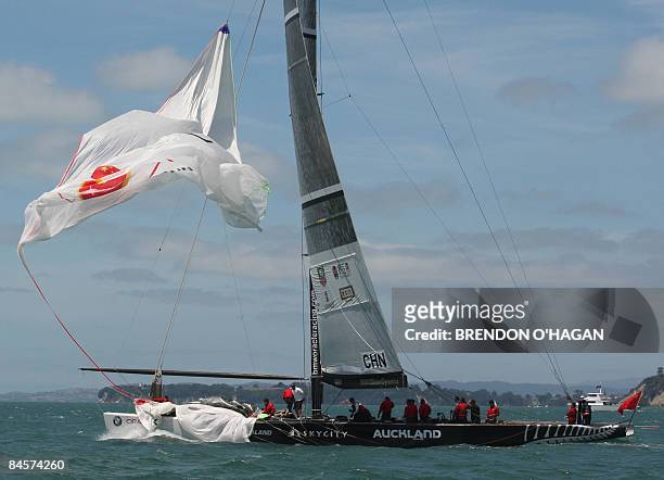 Team China Spinaker rips apart on the last leg during round robin 3 of the series of the Louis Vuitton Pacific Cup Series in Auckland on February 1,...